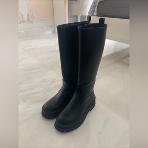 Black knee-high boots